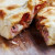 Calzone : Salsa di pomodoro, Mozzarella, Carciofi, Prosciutto cotto, Funghi