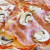 Salsa di pomodoro, Mozzarella, Funghi champignon, Prosciutto cotto, salamino piccante, Olive, Pomodorini