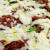 Salsa di pomodoro, Mozzarella, Rucola, Grana, Sfilacci di cavallo
